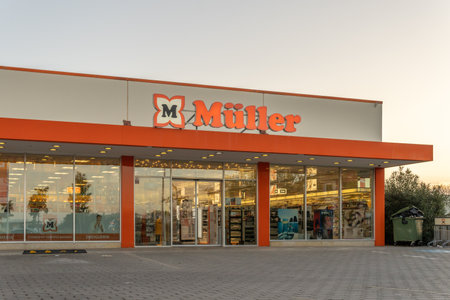 Campos, Spain; October 25 2021: Main facade of the Muller supermarket and drugstore chain closed at sunrise, in the Majorcan town of Campos, Spainのeditorial素材