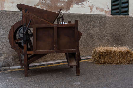 Antique manual almond peeling machinem exhibited at Sa Fira de Porreres, island of Mallorca, Spainの写真素材