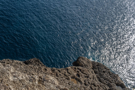 Aerial view of the rocky coast of the island of Mallorca and the Mediterranean Sea. Background image and marine texturesの写真素材