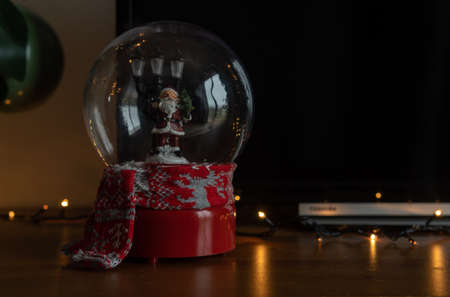 Glass ball with Santa Claus inside with moving snow inside. Christmas resource imageの写真素材