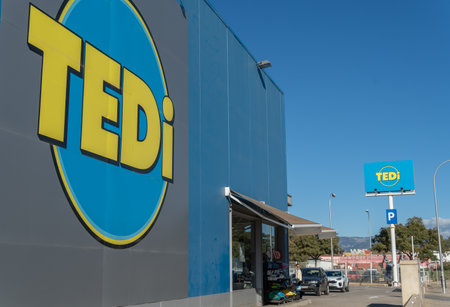 Palma de Mallorca, Spain; December 27 2021: Main facade of the German multinational drugstore company, Tedi, in the city of Palma de Mallorca on a sunny morningのeditorial素材