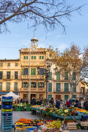 Llucmajor, Spain; january 07 2022: Weekly street market in the Majorcan town of Llucmajor. Vendors...