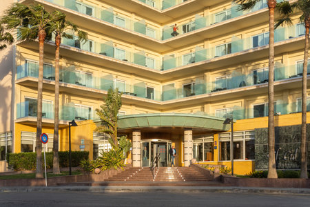 Palma Beach, Spain; April 23 2022: Main facade of the THB El Cid hotel, located in the tourist resort of Playa de Palma de Mallorca, at sunset. Spainのeditorial素材