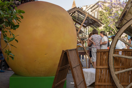 Porreres, Spain; June 04 2022: Annual apricot fair held in the Majorcan town of Porreres, Spain. Street stalls selling apricots and desertsのeditorial素材