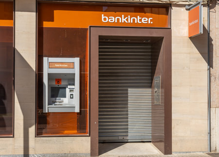 Manacor, Spain; May 14 2022: Closed bank office and ATM of the multinational bank Bankinter. Manacor, island of Majorca, Spainのeditorial素材