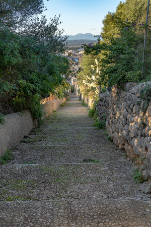 Rural cobblestone road at sunset, in the Majorcan town of Felanitx, Spainの写真素材