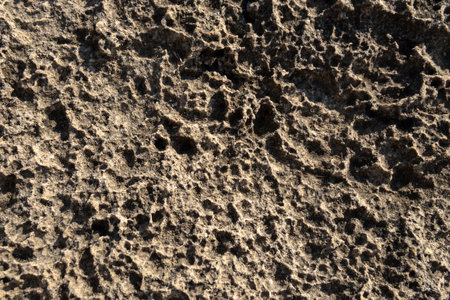 Close-up of the texture of the coastal rock of the island of Majorca at sunrise