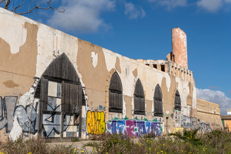 S'Illot, Spain; February 17 2023: Former Rico Rico restaurant, in a state of abandonment and ruin. Island of Majorca, Spainのeditorial素材
