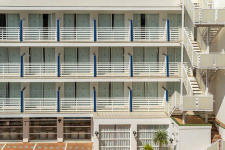 Palmanova, Spain; March 19 2023: Main facade of the hotel of the company Globales Palmanova Palace on a sunny morning. Palmanova, island of Majorca, Spainのeditorial素材