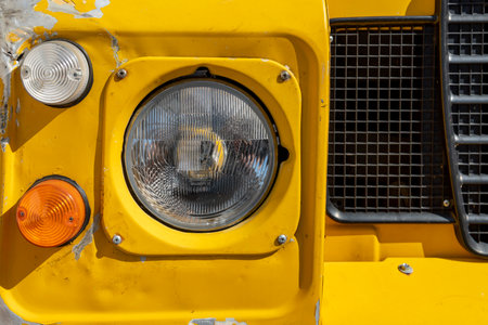 Portocolom, Spain; April 23 2023: Land Rover Santana yellow SUV, parked in the Majorcan town of Portocolom, Spainのeditorial素材