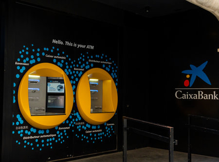 Manacor, Spain; April 30 2023: Bank office of the Spanish bank Caixabank, in the Majorcan town of Portocolom, Spainのeditorial素材