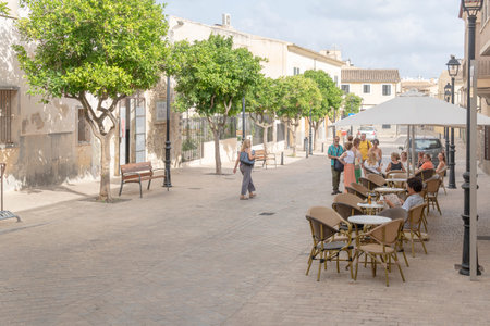 Manacor, Spain; July 21 2023: Terrace of a cafeteria with customers in summer, in the Majorcan town of Manacor, Spainのeditorial素材