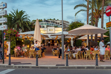 Palma de Mallorca, Spain; September 01 2023: General view of the marina in the tourist resort of Puerto Portals, island of Mallorca, Spain. Terrace with clients of the famous Cappuccino restaurantのeditorial素材