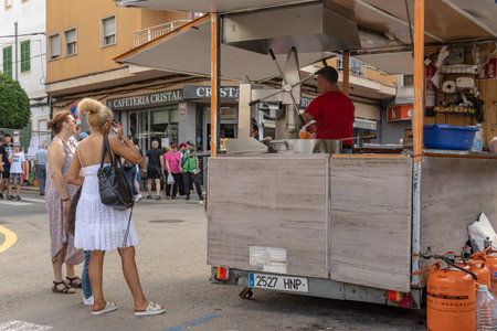 Felanitx, Spain; October 08 2023: Sunday weekly street market in the historic center of the Mallorcan town of Felanitx with tourists strolling around. Spainのeditorial素材
