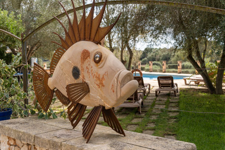 Felanitx, Spain; October 06 2023: Son Menut agrotourism and riding school, in the Majorcan town of Felanitx, Spain. Metal sculpture of a fishのeditorial素材