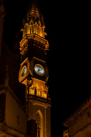 Night view of the clock tower of the parish church in the Majorcan town of Manacor, Spain