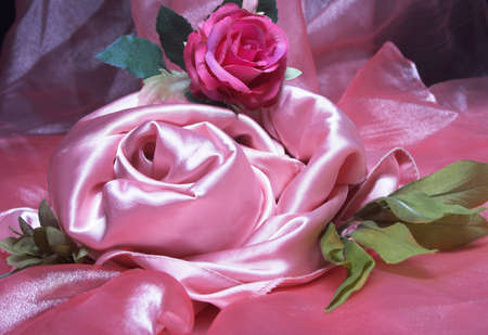 Rose and pink silk fabric.  Beautiful background.の写真素材
