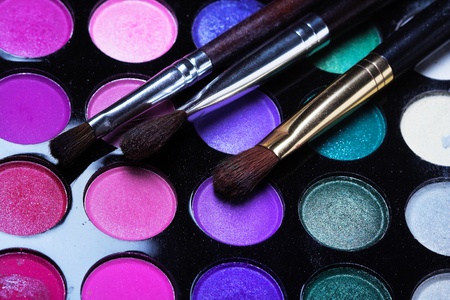 Professional cosmetics. Eyeshadows of different colors. Artistic backgroud.の写真素材