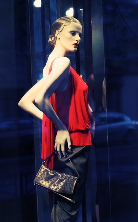 Photo of modern clothing shop window with mannequin/の写真素材