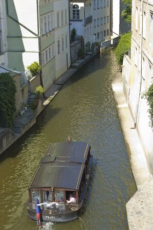 Prague, Czech - 03 July, 2015: Certovka channel which separates Campa Island from the Lesser Town of Prague. Buildings on its banks gave this place the name of the 'Prague Venice'のeditorial素材