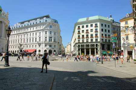 Vienna, Austria - 04 July 2015 : Michaelerplatz is star-shaped square which connected Hofburg with four adjoining streets. In the middle of the square located the ruins of ancient roman fortifications. Due this fact Michaelerplatz considered to be historiのeditorial素材