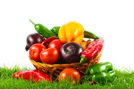 vegetable on green gras on isolated white  backgroundの写真素材