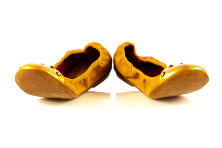 Girl shoes footwear isolated on white の写真素材