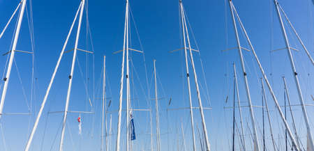 mast against a blue sky, ship mast, marina in European city, the Adriatic seaの写真素材