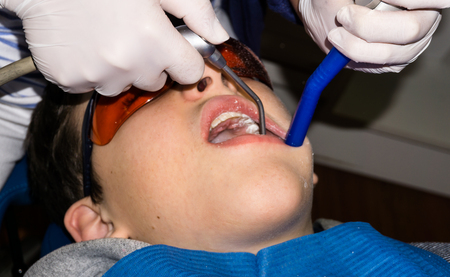 boy in dental treatment. brace. health careの写真素材