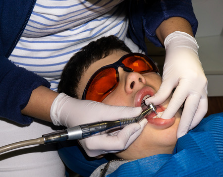 boy in dental treatment. brace. health careの写真素材