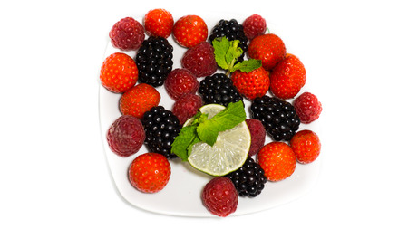 dessert various berries isolated on white backgroundの写真素材