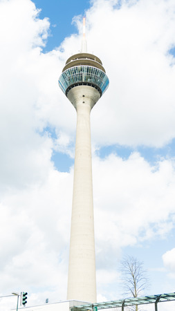 tv tower in dusseldorf on clowdy sky background. germanyのeditorial素材