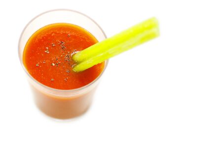 Bloody mary with celery isolated on white background.の写真素材
