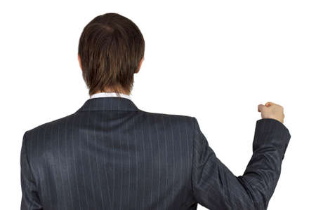 Businessman holding up from back an imaginary poster isolated on white background.の写真素材