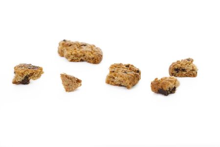 Detail of chip cookie leftovers isolated on white background.の写真素材