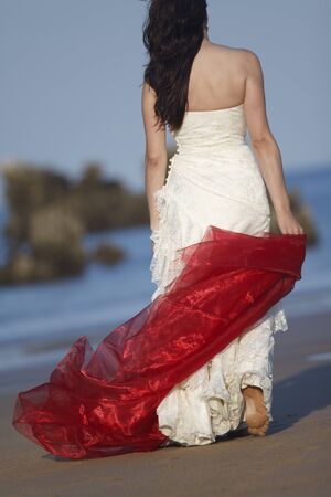 Bride with red ribbon.の写真素材