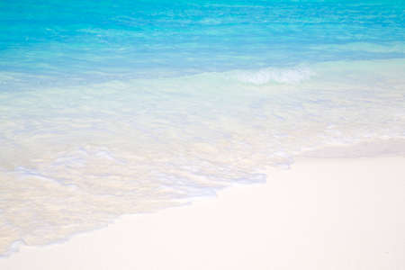 Detail of tropical beach in paradise with clear crystal water in Maldives. Beautiful tones of turquoise in the sea.の写真素材