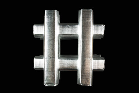 Drop Cap Number Sign on a black background