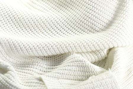 White knitted fabric as backgroundの写真素材