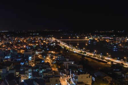 part of the night city of Nha Trang, the Kai river, in the light of street lights, Vietnamの写真素材