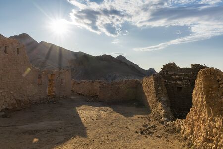 the walls of the dilapidated houses of the village in the Atlas Mountains, sanctified by morning...