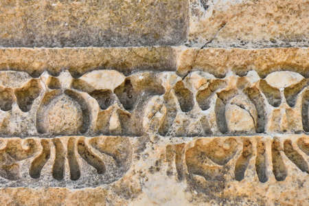 ornament, antique ancient greek pattern on the stone wall of the ancient city of Phaselis, founded...