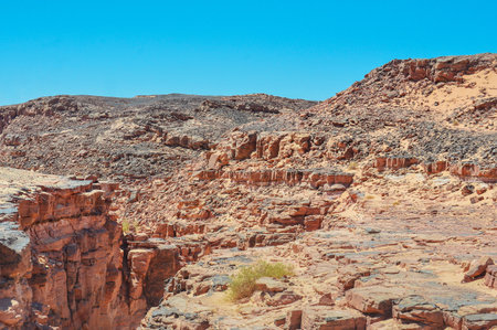 Rocks of multicolored sandstone in a colored canyonの写真素材
