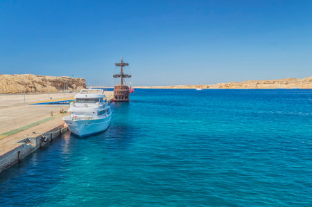 yacht and sailboat in the seaport at the mooring wallの写真素材