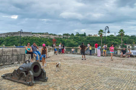 2015-12-05 Local residents and guests of the capital, on the streets of the historic center of Havana, Cuba. The Old Havana is wholly included by UNESCO on the World Heritage List of Humanityのeditorial素材