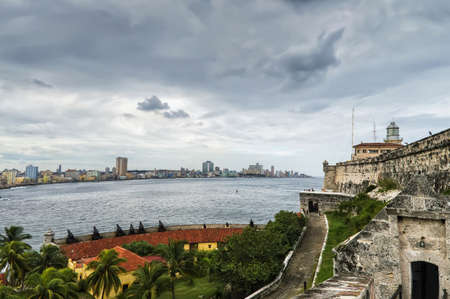 View from the fortress of El Morro, across the strait, to Havana, Cubaの写真素材