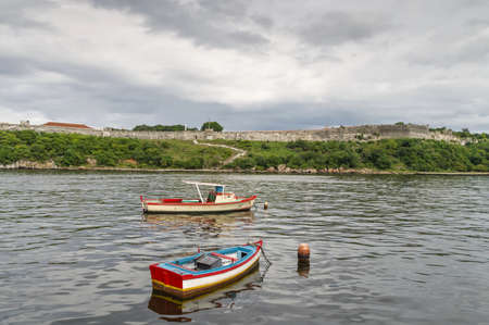 fishing boats of Cuban fishermen at the quay of Malecon, havana, Cubaの写真素材