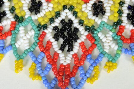 Closeup on a colorful beadwork.