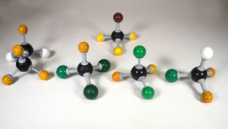 Molecule models of some CFC gases used as refrigerants: From Left R134a, R11, R12, in background...