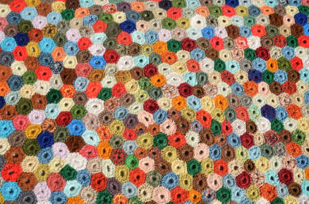 Closeup on a crocheted patchwork rug.の写真素材